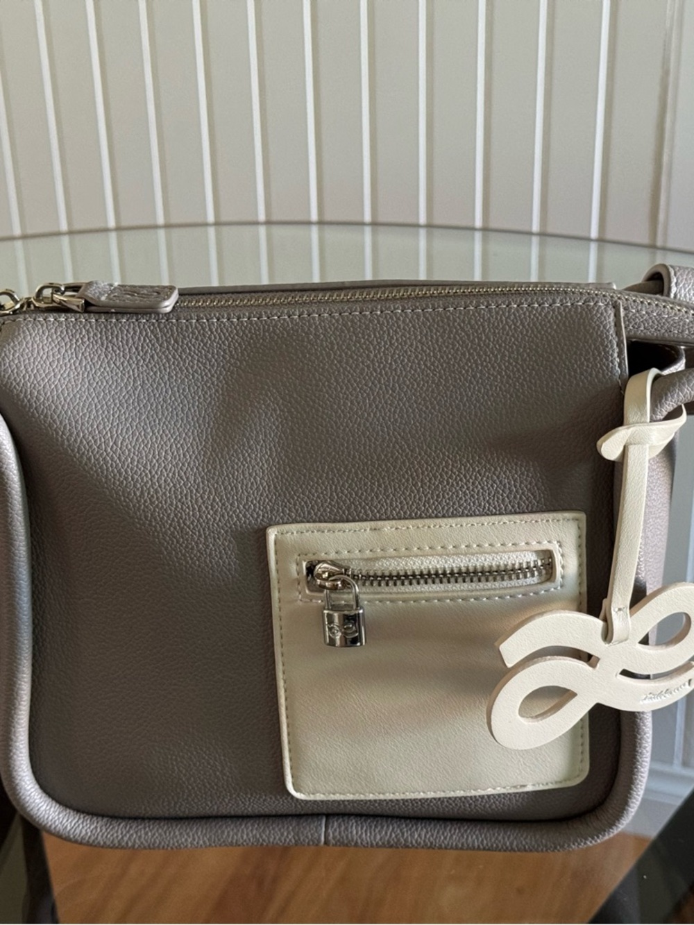 Gray and Cream Crossbody Bag with Decorative Charm